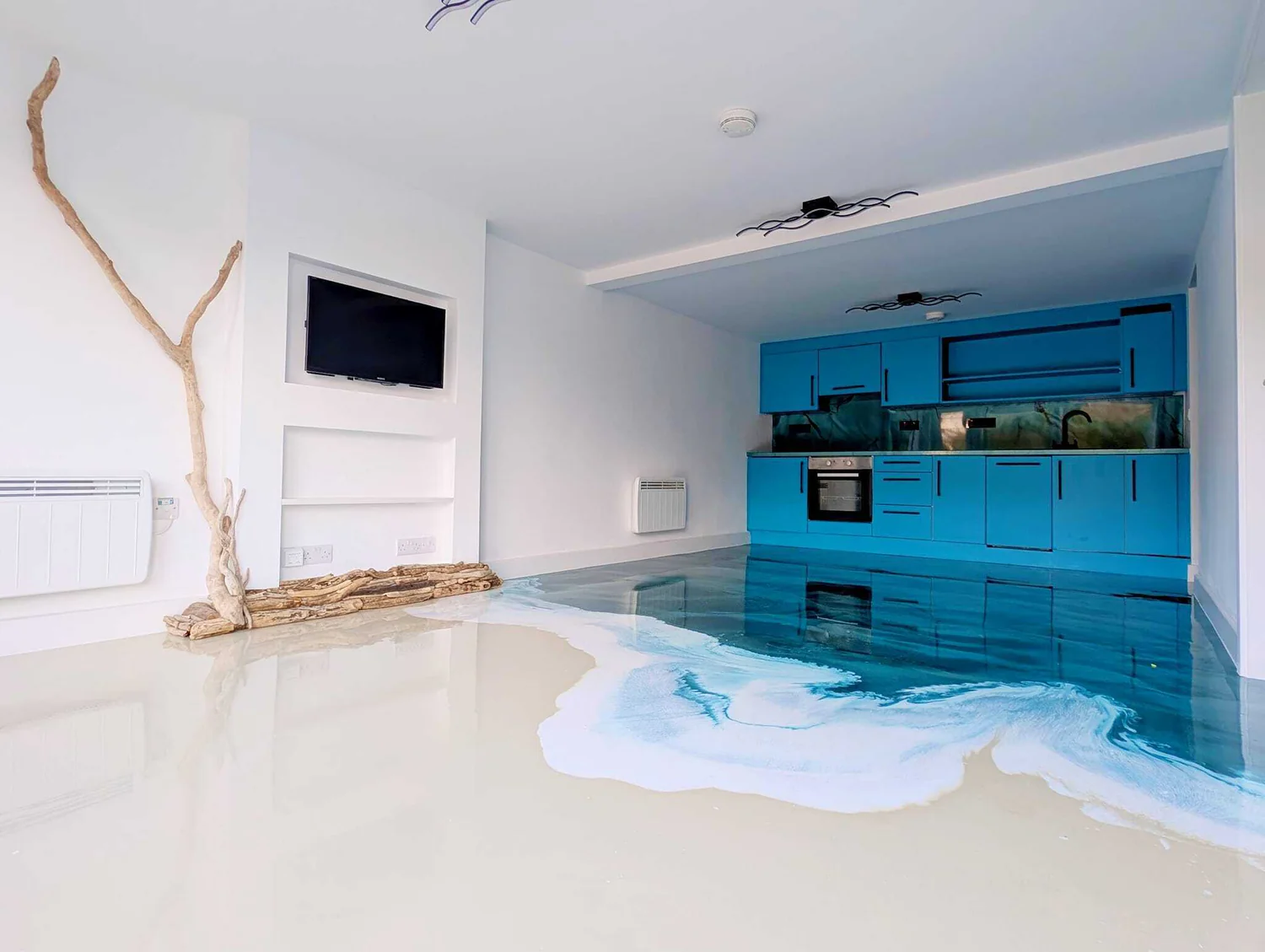 Blue metallic epoxy flooring installation in Boise ID